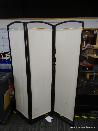 (SHOW2) TRI-FOLD SCREEN; BLACK METAL FRAMED TRI-FOLD SCREEN WITH CREAM COLORED CANVAS FABRIC PANELS.