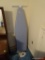 (UPBR2) IRONING BOARD AND IRON; WHITE METAL FOLDING IRONING BOARD WITH BLUE COVER. LOT ALSO INCLUDES