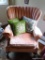(FAM) BARREL BACK ARMCHAIR; FADED PINK FABRIC ARMCHAIR WITH A SHELL DETAILED BARREL BACK. SITS ON 4