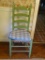 (DR) LADDERBACK CHAIR; GREEN PAINTED LADDER BACK CHAIR WITH A WOVEN SEAT AND 2 SEAT CUSHIONS. SITS
