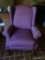 (DEN) WING BACK ARM CHAIR; PINKISH RED FABRIC ARMCHAIR WITH A WINGED BACK AND ROLLED ARMS. SITS ON