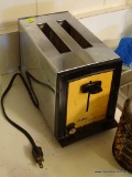 (KIT) VINTAGE ASTRA TOASTER; BLACK AND STAINLESS STEEL ATRA BY TOASTMASTER 2 SLICE TOASTER.