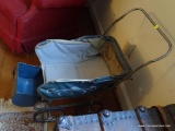 (UPMR) ANTIQUE DOLL CARRIAGE; BLUE VINYL BABY DOLL CARRIAGE WITH WHITE SCROLLING PATTERN ON BOTH