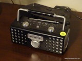 (UPSIT) SET OF BATTERY POWERED RADIOS; LOT INCLUDES A TOZAJ MINI AM/FM PORTABLE RECEIVER, AND A