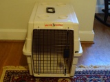 (UPSIT) WAGGIN CORRAL DOG KENNEL; COLLAPSIBLE CREAM COLORED SMALL DOG CRATE/KENNEL. HAS BLACK LOCKS