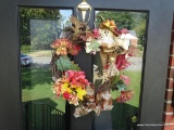 (OUT) FALL WREATH; GRAPEVINE FALL/AUTUMN WREATH WITH LEAVES AND SCARECROW. MEASURES 13 IN DIAMETER.