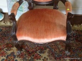 (FAM) VICTORIAN STYLE ARMCHAIR; WOODEN ARM CHAIR WITH A FLORAL CARVED TOP AND A ROUND PINK FABRIC