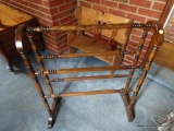 (SDRM) BLANKET RACK; WOODEN BLANKET RACK WITH TAPER DETAILED POLES. MEASURES 2 FT 3.5 IN X 1 FT .5