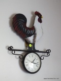 (DEN) ROOSTER CLOCK; QUARTZ ROOSTER WALL HANGING CLOCK. WOODEN ROOSTER STANDING ON A METAL SCROLL