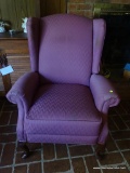 (DEN) WING BACK ARM CHAIR; PINKISH RED FABRIC ARMCHAIR WITH A WINGED BACK AND ROLLED ARMS. SITS ON