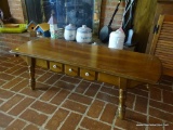 (DEN) WOODEN COFFEE TABLE; WOOD GRAIN COFFEE TABLE WITH A ROUND EDGE TABLE TOP AND A FAUX DRAWER ON