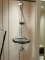 GLASS CHANDELIER; METAL POLE CHANDELIER WITH 3 LIGHTS IN THE MIDDLE AND HANGING GLASS GEM SHAPES