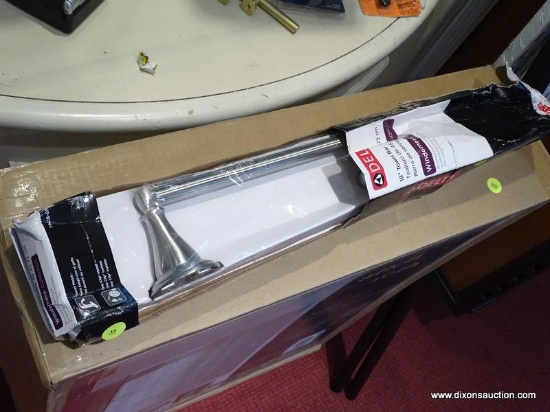 DELTA 18'' TOWEL BAR, IN THE ORIGINAL PACKAGE. BOX IS DAMAGED ITEM IS NEW.