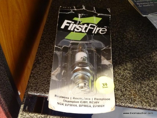 FIRST FIRE SPARK PLUG IN ORIGINAL PACKAGING. ITEM HAS BEEN REPACKAGED.