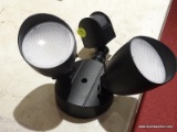 MOTION DETECTOR SPOT LIGHT; MOTION SENSOR OUTSIDE LIGHT WITH 2 BULBS. HAS AN ADJUSTABLE TIMER. OUT