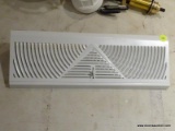 AIR VENT COVER; WHITE METAL BOTTOM OF WALL AIR VENT COVER WITH A OPEN AND CLOSING FLAP.
