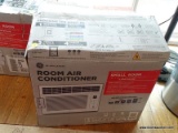 GE SMALL ROOM AIR CONDITIONER IN ORIGINAL BOX. THE BOX IS OPENED, THE ITEM IS NEW.