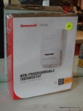 HONEYWELL THERMOSTAT; WHITE NON-PROGRAMMABLE THERMOSTAT. COMPATIBLE WITH HEAT ONLY SYSTEMS. NEW IN