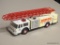 SERVCO TOY FIRE TRUCK BANK; SERVCO 1990 TOY FIRE TRUCK COIN BANK WITH AN EXTENDING LADDER, HEAD AND