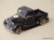 FORD MODEL PICKUP TRUCK; MBI 1935 FORD DIECAST BLACK PICK UP TRUCK WITH OPENING TAILGATE AND DOORS.