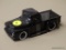 FORD MODEL PICKUP TRUCK; JADA TOYS 1956 FORD BLACK F-100 PICKUP WITH WHITE RIMS, A COVERED BED, AND