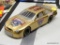 NASCAR MODEL CAR; ACTION 1998 FORD TAURUS NASCAR'S 50TH ANNIVERSARY COMMEMORATIVE CAR. SCALE 1:24.