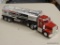 AMOCO TOY OIL TANKER; AMOCO 1997 TOY OIL TANKER WITH A SILVER TANK AND RED CAB. OUT OF BOX.