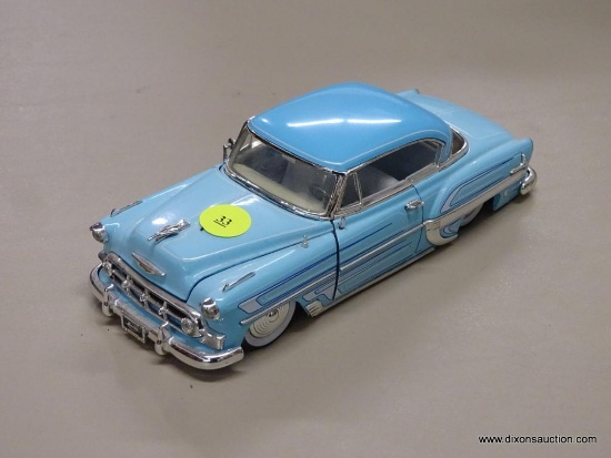 JADA TOYS CHEVROLET MODEL CAR; JADA TOYS BLUE 1953 CHEVROLET BEL AIR MODEL CAR WITH STRIPE DETAILING