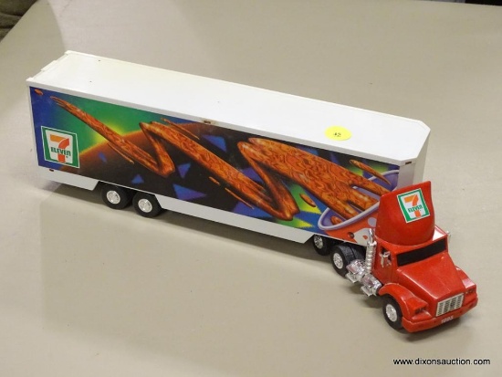 MODEL 18 WHEELER; 7/11 MODEL 18 WHEELER WITH AND OPENING BACK AND HORN AND ALERT SOUND EFFECTS.