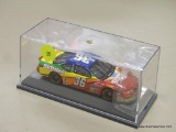 DERRIKE COPE MODEL CAR; REVELL COLLECTION DERRIKE COPE #36 SKITTLES 1997 PONTIAC GRAND PRIX. SCALE