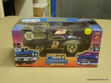 ACTION MUSCLE MACHINES; MUSCLE MACHINES 1969 DODGE CHARGES FROM #2 RUSTY WALLACE. SCALE 1:24. COMES
