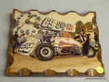 RACING WOODEN WALL CLOCK; WALL HANGING CLOCK WITH A GLOSS FINISH OVER A PICTURE OF VAN MAY NEXT TO