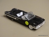 CHEVROLET MODEL CAR; 1960 CHEVROLET IMPALA BLACK AND WHITE MODEL CAR WITH OPENING SIDE DOORS. SCALE