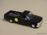 CHEVROLET MODEL PICK UP; 1990 CHEVROLET BLACK PICKUP TRUCK. MADE FROM PLASTIC. OUT OF BOX.