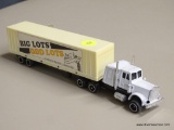 MODEL 18 WHEELER; BIG LOTS ODD LOTS 18 WHEELER WITH A WHITE METAL CAB AND A LIGHT YELLOW PLASTIC