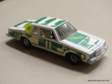 MOUNTAIN DEW MODEL CAR; THE ERTL COMPANY MOUNTAIN DEW RACING TEAM'S 1980 CAPRICE #11 WITH AN OPENING