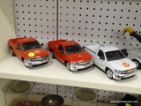 LOT OF CHEVY MODEL TRUCKS; 3 PIECE LOT OF 2012 CHEVY SILVERADO MODEL TRUCKS WITH SOUND EFFECTS, HEAD