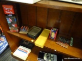 LOT OF ASSORTED GAMES; 7 PIECE LOT OF ASSORTED GAMES TO INCLUDE A CHINESE FINGER TRAP, A MINIATURE