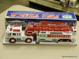 HESS FIRE TRUCK; HES 2000 TOY FIRE TRUCK WITH HEAD AND TAIL LIGHTS, AN EXTENSION LADDER,