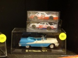 LOT OF ASSORTED COLLECTIBLE CARS; 3 PIECE LOT OF COLLECTIBLE DIE CAST CARS TO INCLUDE A RACING