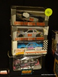 4 PIECE LOT; INCLUDES 2 LIMITED EDITION GRAND NATIONAL SERIES #94 CARS, A RACING COLLECTIBLES #89