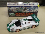 HESS RACING TOY LOT; INCLUDES A RACE CAR AND RACER IN THE ORIGINAL BOX! INCLUDES REAL FLASHING