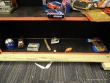 SHELF LOT OF RACING COLLECTIBLES; INCLUDES A VINTAGE AVON MOTOCROSS HELMET 6 FL OZ AFTER SHAVE