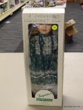 SEYMOUR MANN COLLECTIBLE PORCELAIN DOLL; FROM THE CONNOISSEUR COLLECTION COLLECTIBLE PORCELAIN DOLL