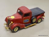 FORD V8 MODEL TRUCK; SOLIDO 1936 FORD MODEL PICKUP TRUCK WITH A RED, BLACK AND GOLD TONE FINISH.