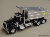 TOY DUMP TRUCK; KENWORTH TOY DUMP TRUCK WITH A CHROME TRAILER, A BLACK CAB, AND A DUMPING TRUCK BED