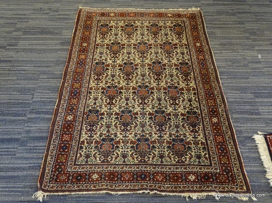 HAND KNOTTED AREA RUG; RED AND CREAM COLORED AREA RUG WITH RED, PINK, AND NAVY FLOWERS. MEASURES 3