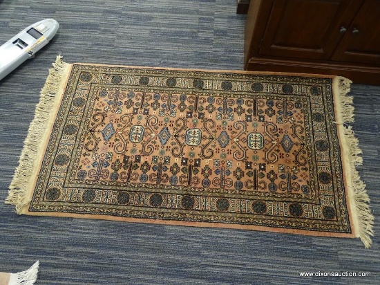 HAND KNOTTED RUG; PALE PINK RUG WITH CREAM, BLUE & SAGE GREEN MEDALLIONS & FLOWERS. HAS FRINGE