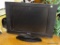 (R2) SYLVANIA MONITOR; SYLVANIA 20 IN LCD COLOR TV WITH A PLASTIC TV STAND. MODEL LC200SL9. DOESN'T