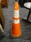 (R3) TRAFFIC CONE; ORANGE TRAFFIC CONE WITH REFECTING STRIPES AND A GREEN SQUARE BASE. MEASURES 35